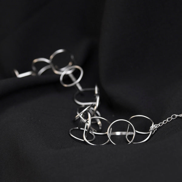 Pursuits: Loops Bracelet - Silver or Gold