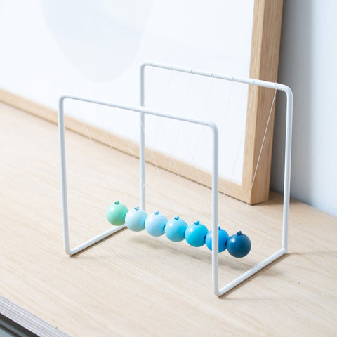 Gradient Newton's Cradle