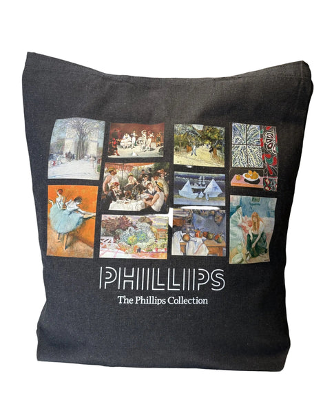 A black canvas tote bag featuring a collage of nine classic art prints from The Phillips Collection, with the text 'PHILLIPS The Phillips Collection' printed in white below the artwork.